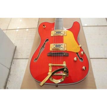 Orange Fender Precision Electric Guitar